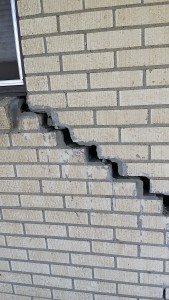 cracked brick near a window