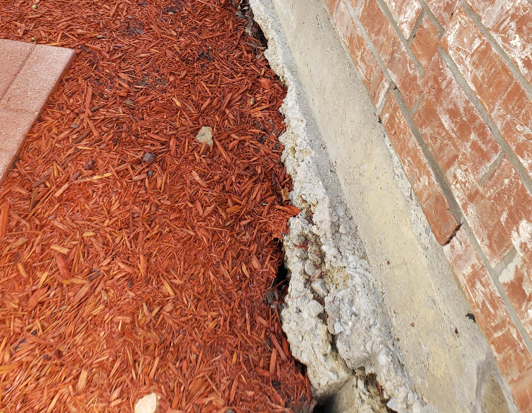a faulty drain has caused the foundation to crack